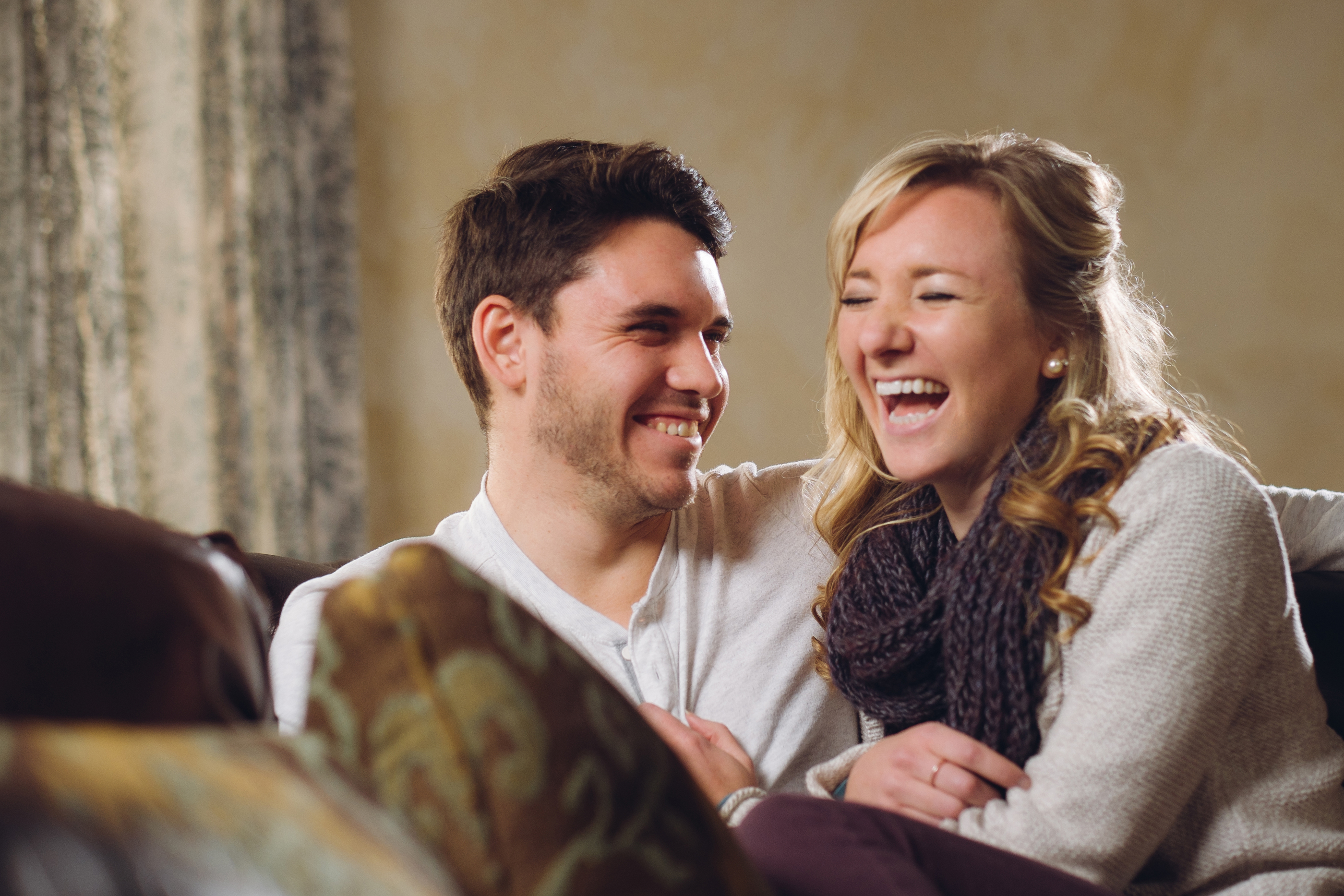 caucasian couple laughing together